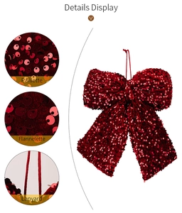Detail display of red sequin Christmas bow with flannelette backing and hanging lanyard