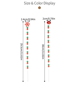 Maatdetails voor rood-witte kerstzuurstokken met kralen en feestelijke kerstbelletjes