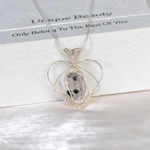 Handmade silver wire-wrapped heart pendant with natural black rutilated quartz stone