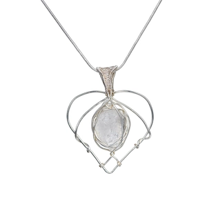 Handmade silver wire-wrapped heart pendant necklace with natural clear crystal stone