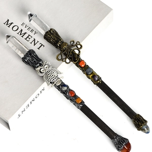 Wizard magic wand set with natural white crystal points and mystical metal animal emblems