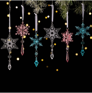 Detailed view of colorful acrylic snowflake ornaments with faceted crystal pendants
