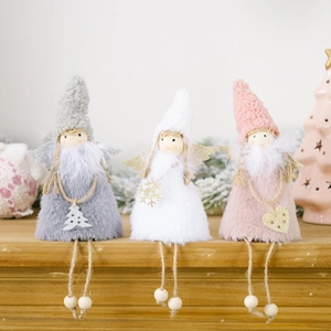 Three plush Christmas angel ornaments in grey, white and pink with feather collars