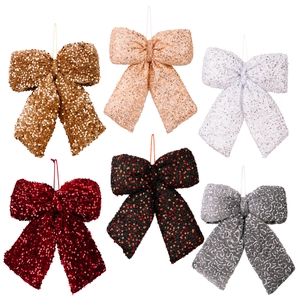 Set of six colorful sequined Christmas bows for holiday tree and wedding party decorations