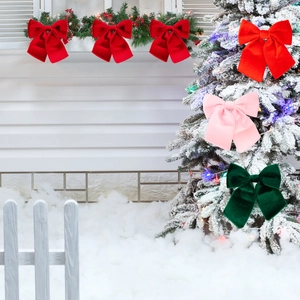 Velvet Christmas bows in red, pink, and green for festive tree and holiday home decoration