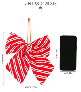 Detailed size view of red and white striped Christmas bow hanger with phone comparison