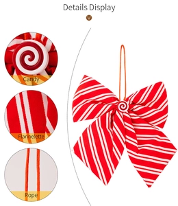 Macro detail of red and white striped Christmas bow with candy center and soft flannelette