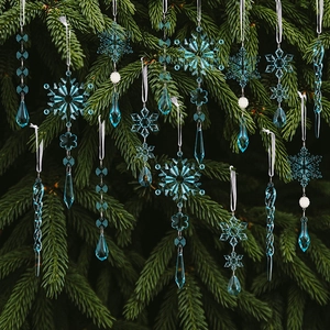 Macro detail of clear acrylic Christmas icicles and snowflake ornaments on tree branches