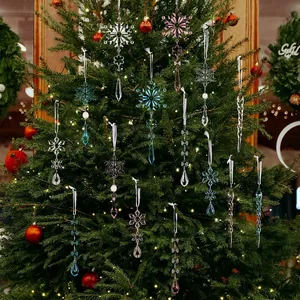 Clear acrylic Christmas icicle and snowflake ornaments on a festive tree with lights