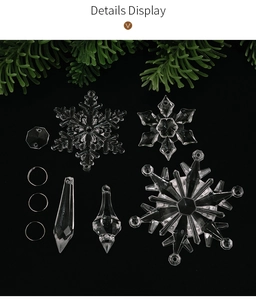 Close-up of transparent acrylic snowflakes and icicle pendants for Christmas decor