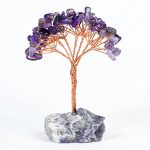 Handmade amethyst crystal tree on raw mineral base for home and office desktop decoration