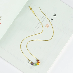 Bohemian style gold chain bracelet with seven colorful natural crystal stones