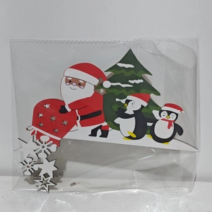 Detailed Christmas door frame ornaments including Santa, tree, and snowflake pendants