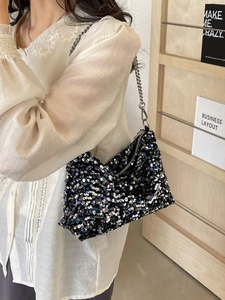 Stylish black sequined crossbody bag with silver chain strap and large capacity