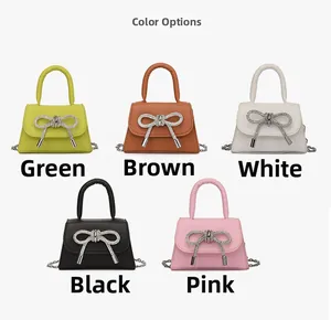 Miniature square bags with rhinestone bows in green, brown, white, black, and pink
