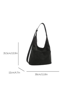 Large black suede hobo bucket bag with front pockets and dimension measurements