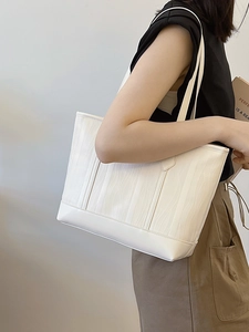 Stylish white tote bag with textured ripple design for women's office commuting