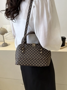 Vintage patterned shell handbag with gold hardware and adjustable strap for women