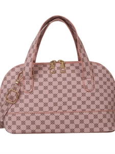 Pink shell handbag with vintage clover print and gold-tone zippers on white background