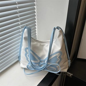 Large capacity bucket bag with blue butterfly embroidery and elegant crossbody strap
