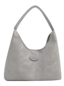 Minimalist dark grey faux leather tote bag with wide strap and logo for daily commute