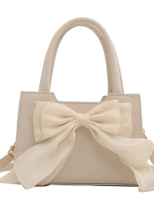 Elegante borsa a mano color crema con maxi fiocco in tulle e tracolla regolabile