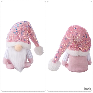 Detailed front and back view of pink sequined Christmas gnome plush with white beard