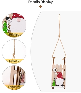 Detailed display of wooden Christmas sled ornament with gnome print and durable lanyard