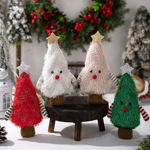 Detail of plush Christmas tree dolls in red, white, pink, and green with glitter stars