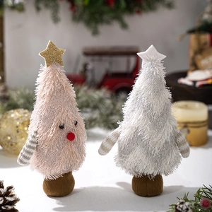Detailed plush Christmas tree figurines in pink and white with festive ornaments