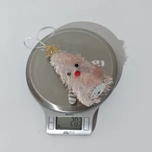 Detailed view of lightweight light-up plush Christmas tree ornament weighing 20.3 grams