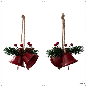Front and back detail of Christmas red metal bells with pine cones and berries