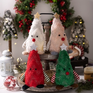 Set of four plush Christmas tree gnomes with sparkling stars on wooden tiered tray