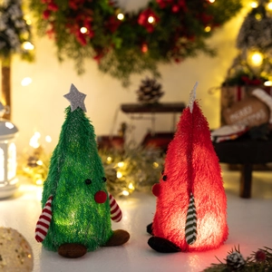 Lighted plush Christmas tree dolls in red and green with glowing LED stars and striped legs