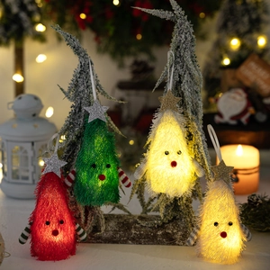 Set of four plush LED Christmas tree ornaments with glowing warm lights and stars