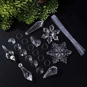 Clear acrylic Christmas ornament set with snowflakes and icicles on festive background