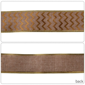 Detail showing front with gold wave pattern and plain burlap back of the Christmas ribbon