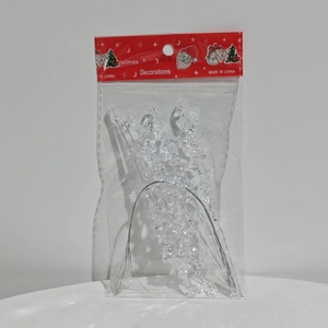 Detailed view of clear acrylic icicle ornaments in festive red header packaging