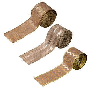 Three rolls of bronze metallic Christmas ribbons with mesh, striped and wave patterns