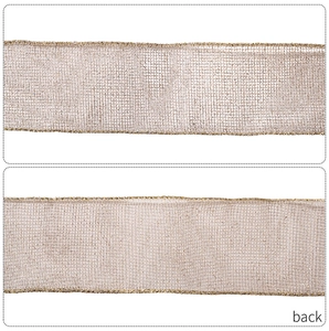 Detail of burlap ribbon with gold stitched edges showing both front and back textures
