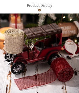 Detail of red and gold glitter mesh ribbons for Christmas gift wrapping and DIY decor