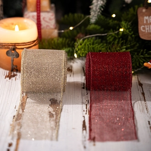 Detail of red and champagne gold glitter mesh ribbon for Christmas gift decoration