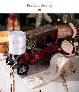 Detail of Christmas ribbon rolls with silver and gold glitter patterns on festive backdrop