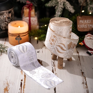 Close-up of sparkling Christmas ribbons with glitter snowflakes and festive ornaments