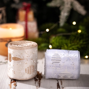 Christmas tree decorative ribbon rolls with glittery gold and silver snowflake patterns