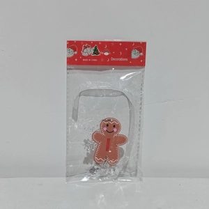 Clear bag view of gingerbread man acrylic ornament with Christmas card packaging