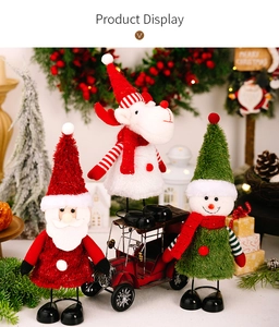 Three plush Christmas figurines featuring Santa, reindeer, and snowman on metal stands