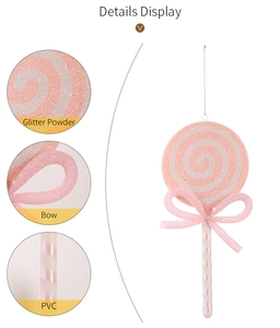 Detailed macro view of glittery pink lollipop ornament with PVC material and a pink bow