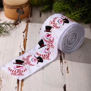 White Christmas ribbon with snowman prints, silver glitter edges and Snow text