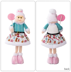 Detail view showing front and back of pink Christmas plush doll with candy print skirt
